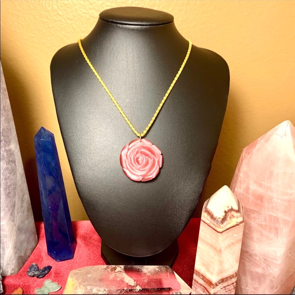 Vintage hand carved cats eye rose